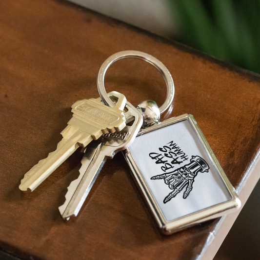 BAD ASS HUMAN SKULL ROCK KEYCHAIN